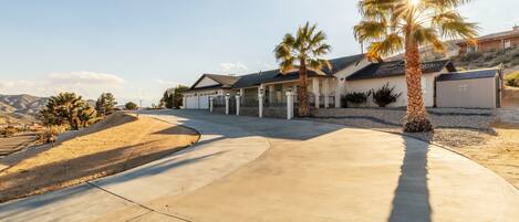 Concrete driveway leading to the property