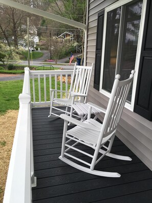 Front porch with rockers overlooking the mountains.