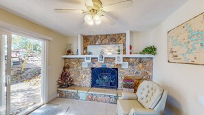 Entrance door & Fireplace in living area  on main level