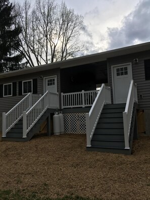 Back of cottages leading to brook on our property.