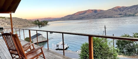 Enjoy spectacular views of beautiful Lake Chelan and amazing sunset pictures from this beautiful home!