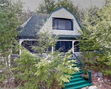 Private 2-Story Cottage with Lake View on 7 Acres