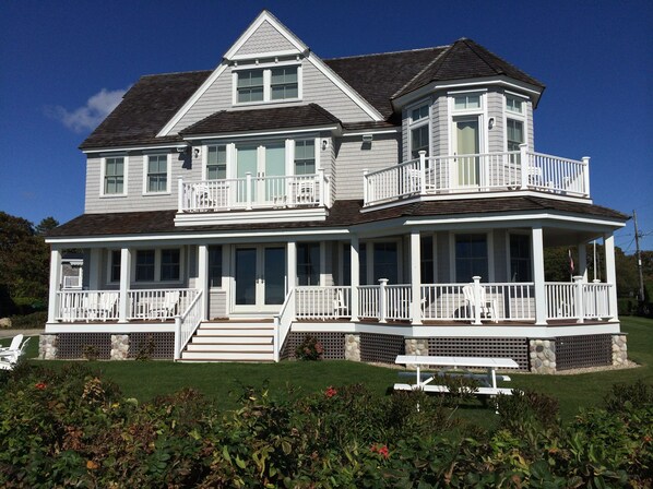 Ocean facing side of house taken from on top of the sea wall. (Fall 2014)