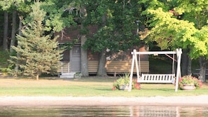 Lakeside swing is perfect place to enjoy a good book or watch the kids play.