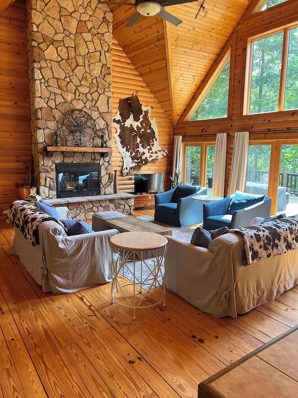 Main living space with expansive walk out deck. 