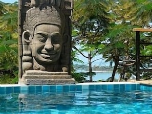 Buddah by the pool