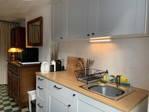 Fully equipped kitchen - induction hob, oven, microwave, fridge, coffee machine