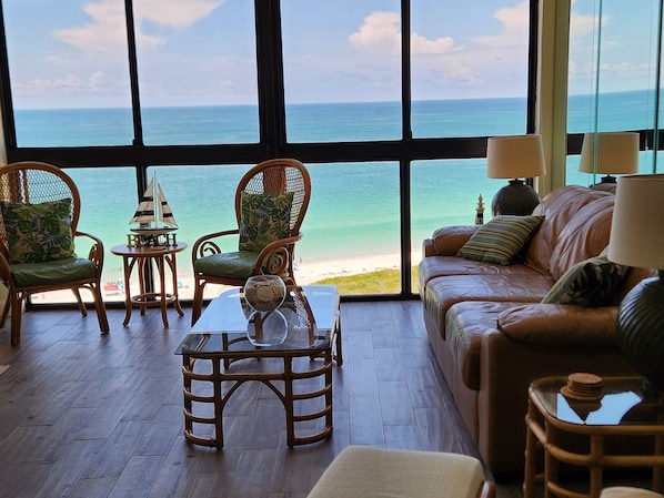 Living Room Comfortable Seating, 
New Tile Flooring throughout condo