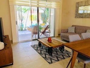 Apartment entrance and living room