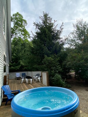 The home's private hot tub is beautiful under the stars.