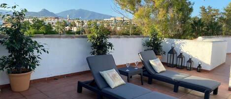 Penthouse with a 200 square meter terrace and unobstructed mountain views