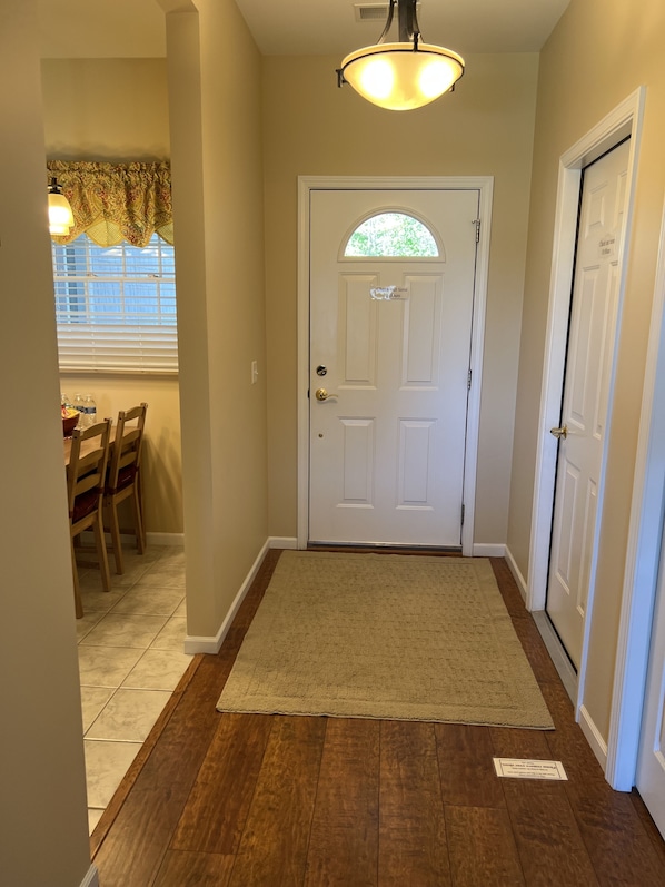 Entry door kitchen to left garage to right this is a picture from the living roo