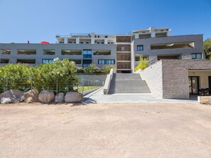 Sky, Building, Plant, Window, Land Lot, Urban Design, Shade, Facade, Stairs, Landscape