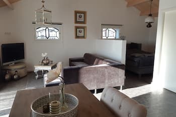 Classy room with a beautiful view over the landscape of the green heart