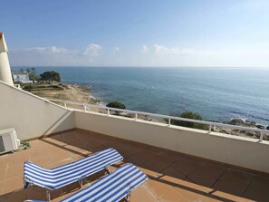Water, Sky, Cloud, Building, Azure, Seaside Resort, Coastal And Oceanic Landforms, Shade, Outdoor Furniture, Wood