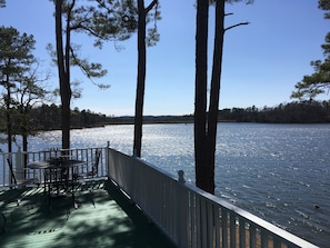 The cabin has a view of the dam. 