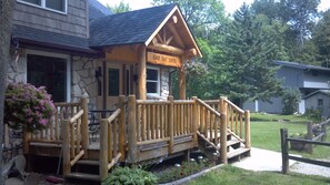 roadside entry deck with patio-set.
