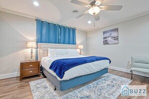 Escape to Serenity in the Primary Bedroom’s King Bed