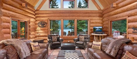 Grand family room down stairs with a view of the Lake 