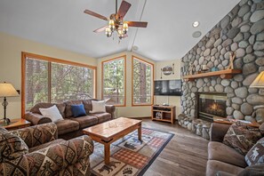 Living room upon stair entrance.