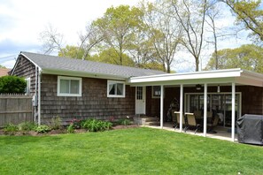 Covered seating for 6 outdoors.