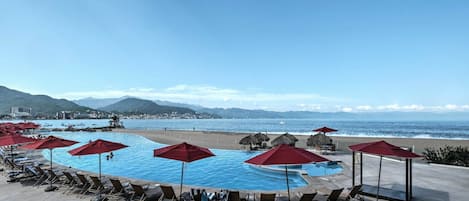 Enjoy views of the beautiful Puerto Vallarta ocean view while lounging poolside!