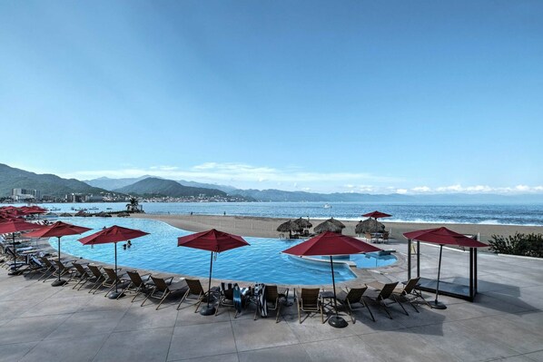 Enjoy views of the beautiful Puerto Vallarta ocean view while lounging poolside!