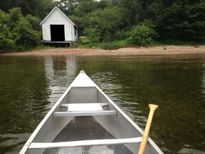 Canoeing on Newfound Lake toward Boat House
