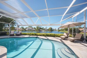 Gorgeous open view screened lanai.  Perfect for entertaining or relaxing.  