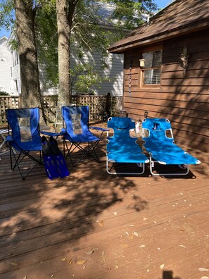 4 beach chairs, towels, 1 pair of swim fins & cooler provided