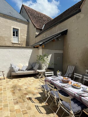 Courtyard dining seats 12 people comfortably