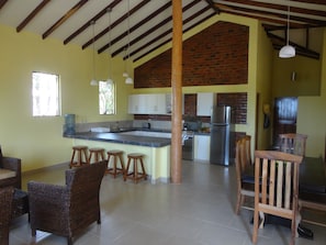 Living room with kitchen and dining area