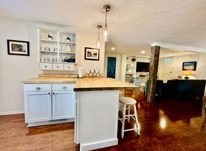 Open concept space to living room and dining room