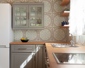 Features a fully equipped kitchen for culinary wonders. 