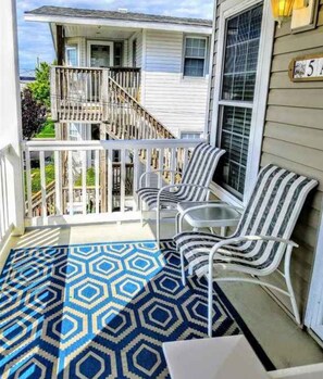 Sunny front porch perfect for your morning coffee 