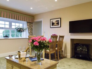 Relaxing living and dining room | The Lodge Cottage, Methven, near Perth