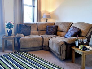 Cosy living room with wood burner | Butterhole Cottage, Mabie, near Dumfries