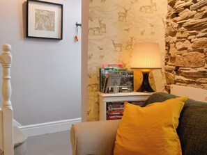 Open plan living space with wood burner | T&#375; ar y Tro, Ffestiniog, near Blaenau Ffestiniog