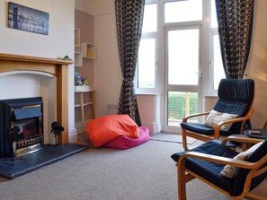 Second sitting room with door to the garden | Zonnebloem, Brymbo, near Wrexham