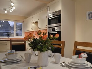 Kitchen and dining area | Three Rivers Cottage, Pont Nedd Fechan, near Glynneath