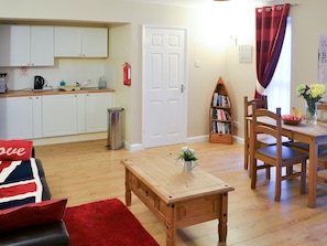 Well-equipped fitted kitchen area | Rose Cottage - Railway Cottages, Acklington, near Amble