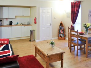 Well-equipped fitted kitchen area | Rose Cottage - Railway Cottages, Acklington, near Amble