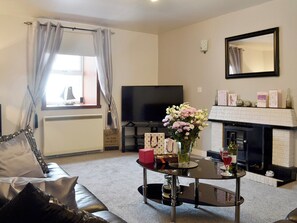 Comfortable living room | Creel Cottage, Auchmithie, near Arbroath