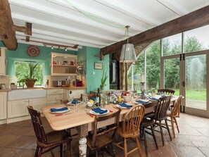 Kitchen and dining area with French doors to garden | Rhydleos Mill, Llansilin, near Oswestry