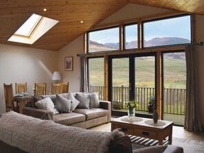 Open plan living space with floor to ceiling windows to take advantage of the stunning surrounding area | Frith View, Glengoulandie, near Aberfeldy