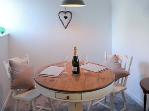 Cosy dining table and chairs | Sea Thistle Cottage, Nairn