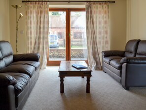 Comfy living area | Church Farm Barn - Moor Farm Stable Cottages, Foxley, near Fakenham