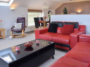 Relaxing sitting room area | The Plucking Barn, Llanwnnen, near Lampeter