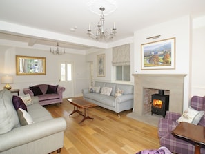 Welcoming living room with wood burner | Haddon Villa, Bakewell