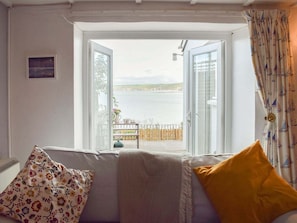 Living room with French doors to the patio | Seadrift, New Quay